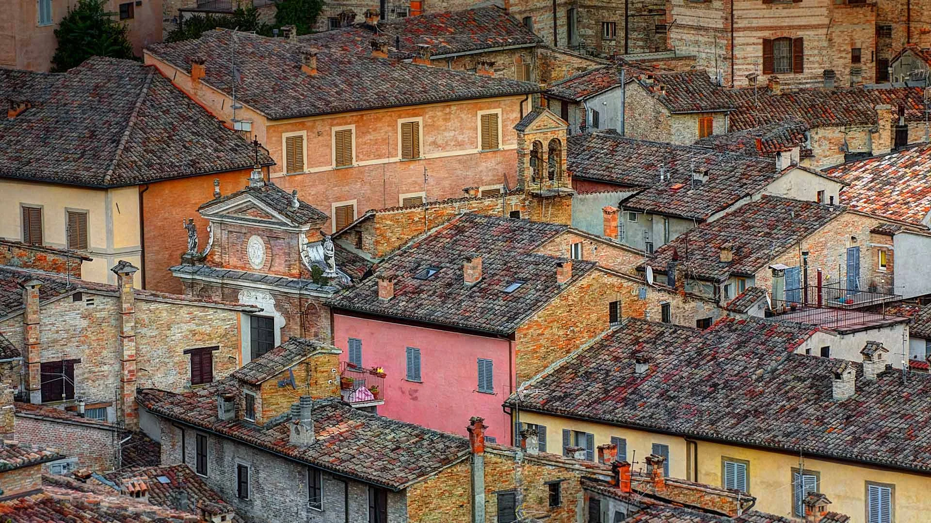 Rooftops in the walled city of Urbino, Italy
