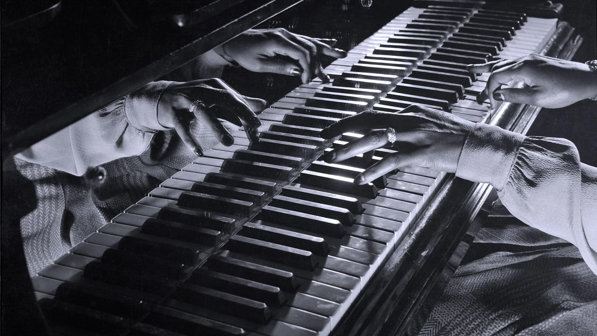 Close-up of the hands of jazz pianist Mary Lou Williams during a jam session held in New York City, 1943