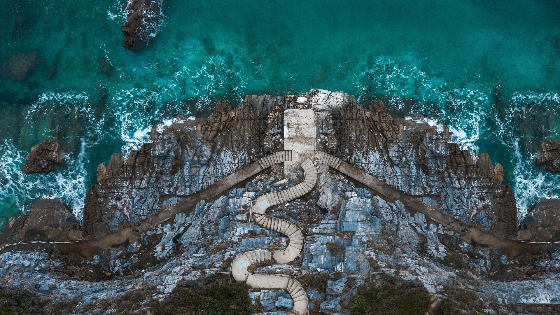 Stairs on the shoreline at Mylopotamos Beach, Thessaly, Greece