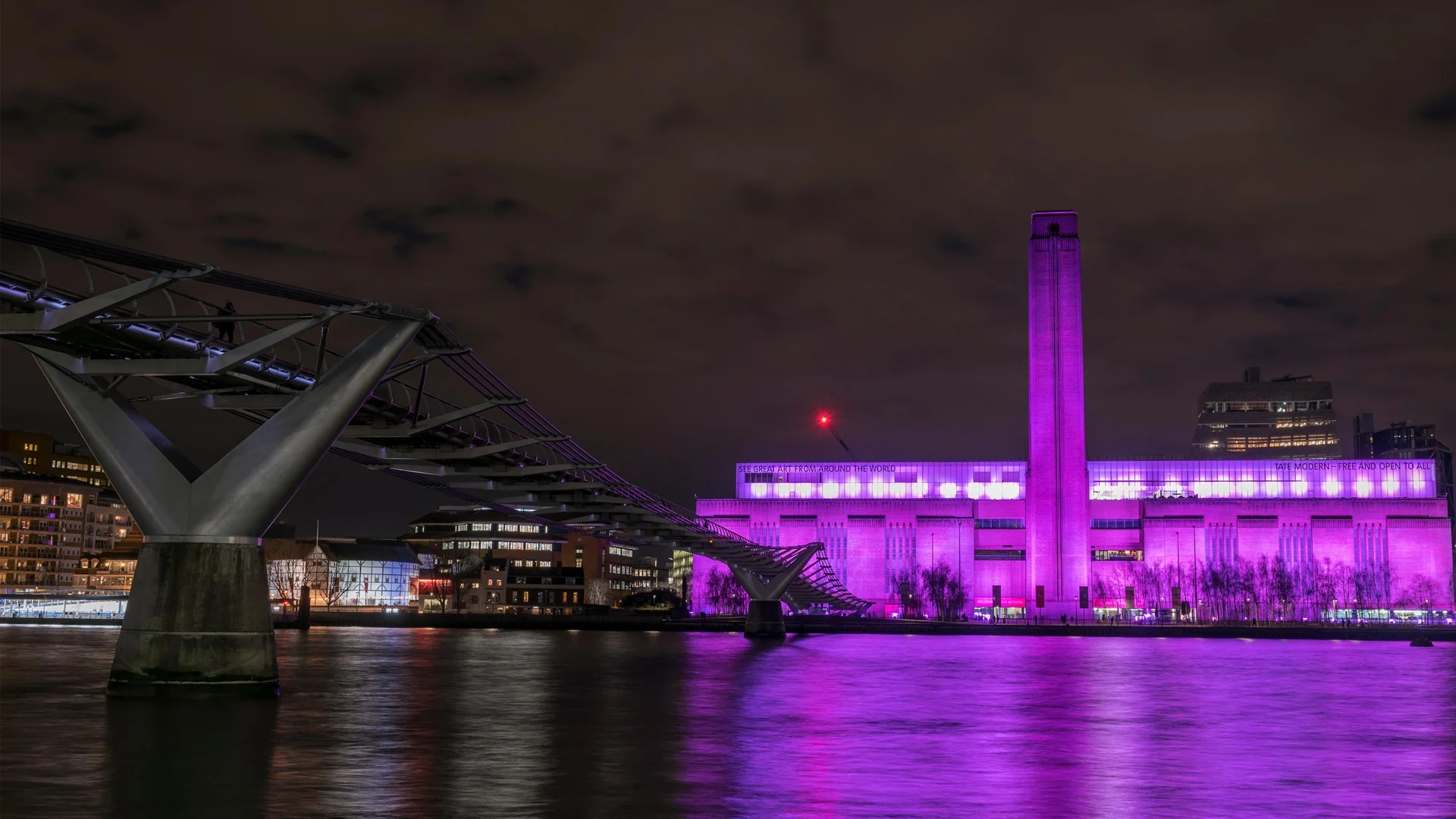 Tate Modern lit up for International Women's Day, London, England