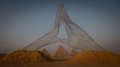 'Together' sculpture by Lorenzo Quinn, Great Pyramids of Giza, Cairo, Egypt